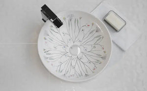 Floral I bathroom vessel sink designed by Claudia Iza Bathco