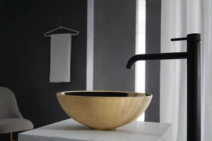 Brest gold bathroom vessel sink. Textured porcelain.
