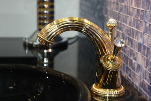 Artica Swarovski® Gold single hole bathroom sink faucet. Luxury faucet, European brand