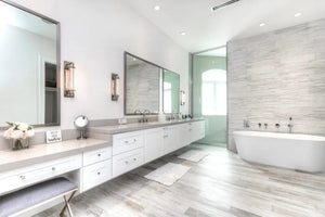 Large custom bathroom vanity double sink plus makeup area. Matte white